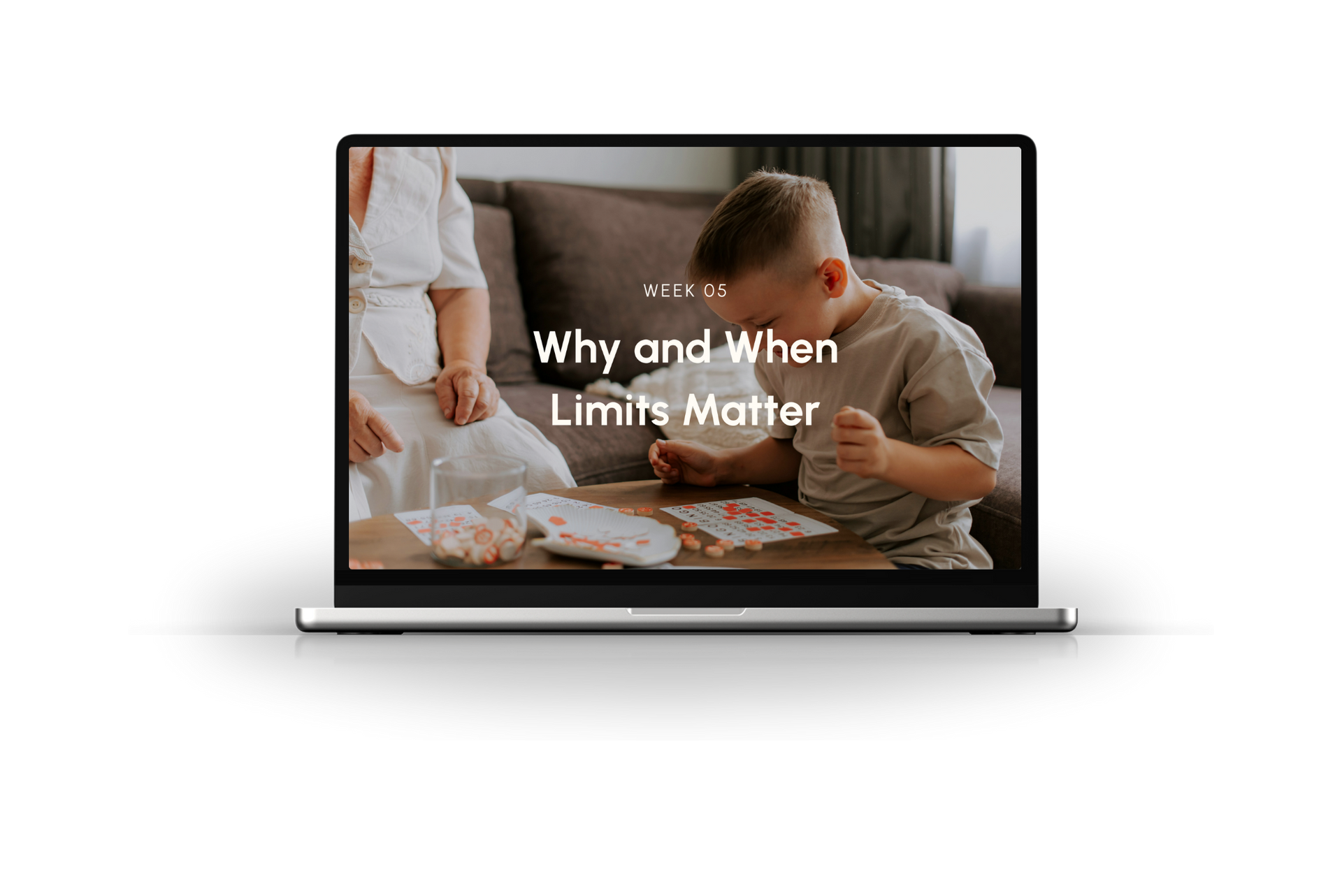 Laptop displaying a child wrapping a gift with the text “Why and When Limit Matter”