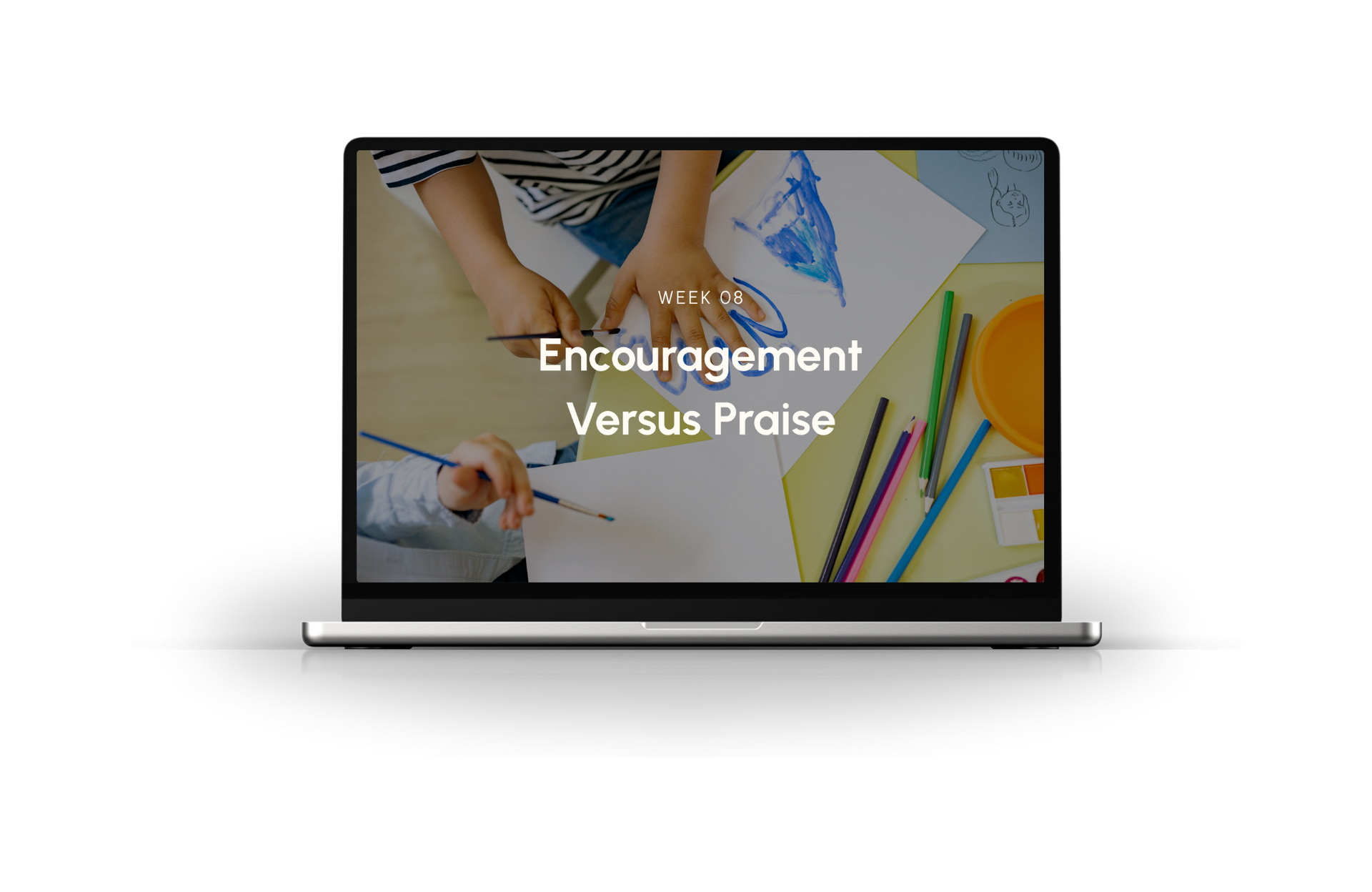 Laptop screen showing “Encouragement Versus Praise” over a colorful desk scene