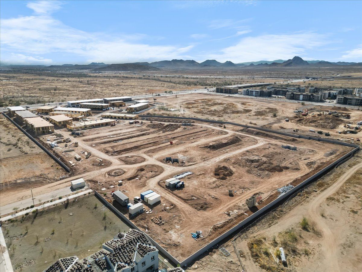 An aerial view of a construction site in the desert.