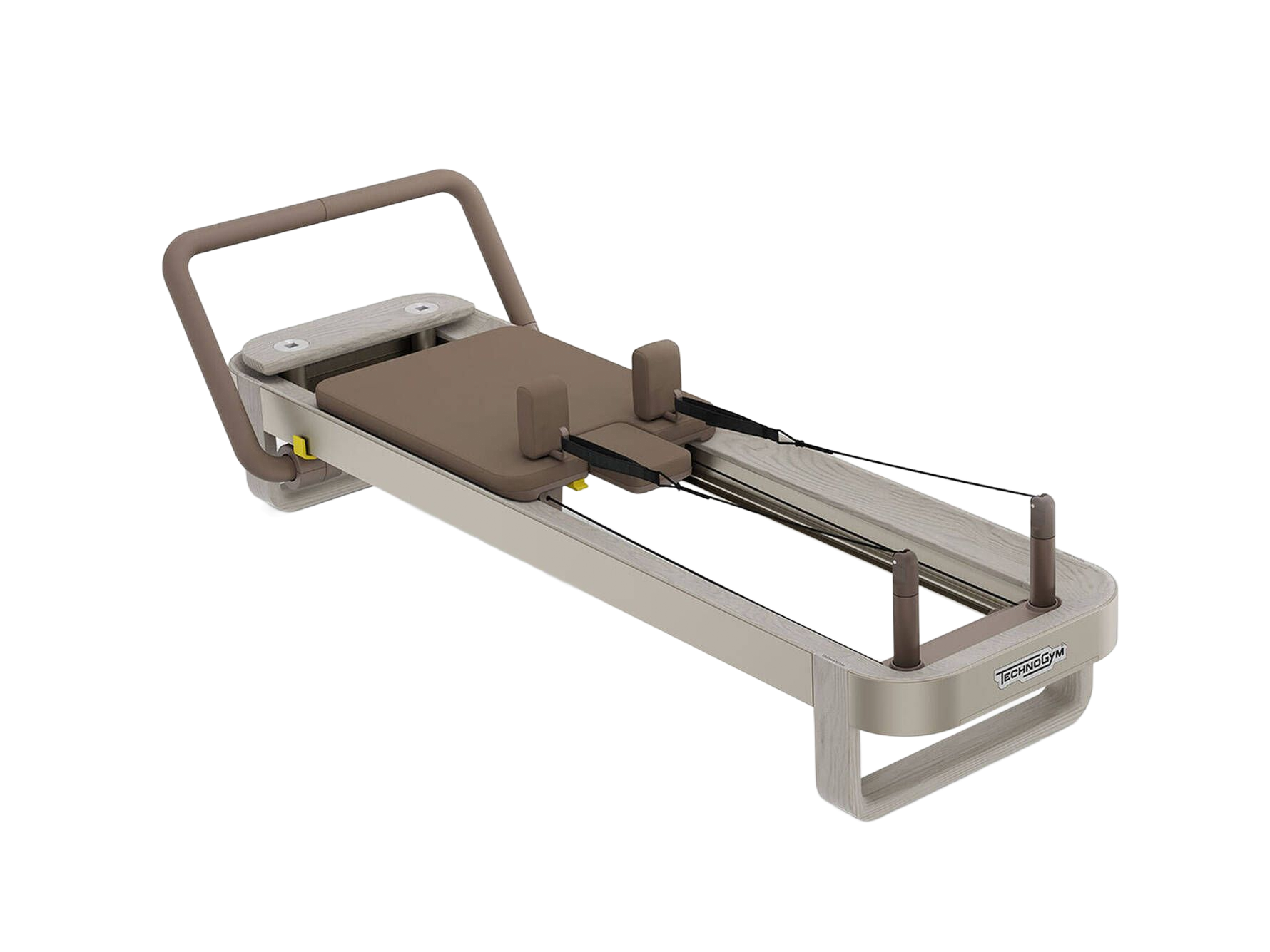 A beige Pilates reformer machine with a brown padded carriage and footbar, set against a plain white background.