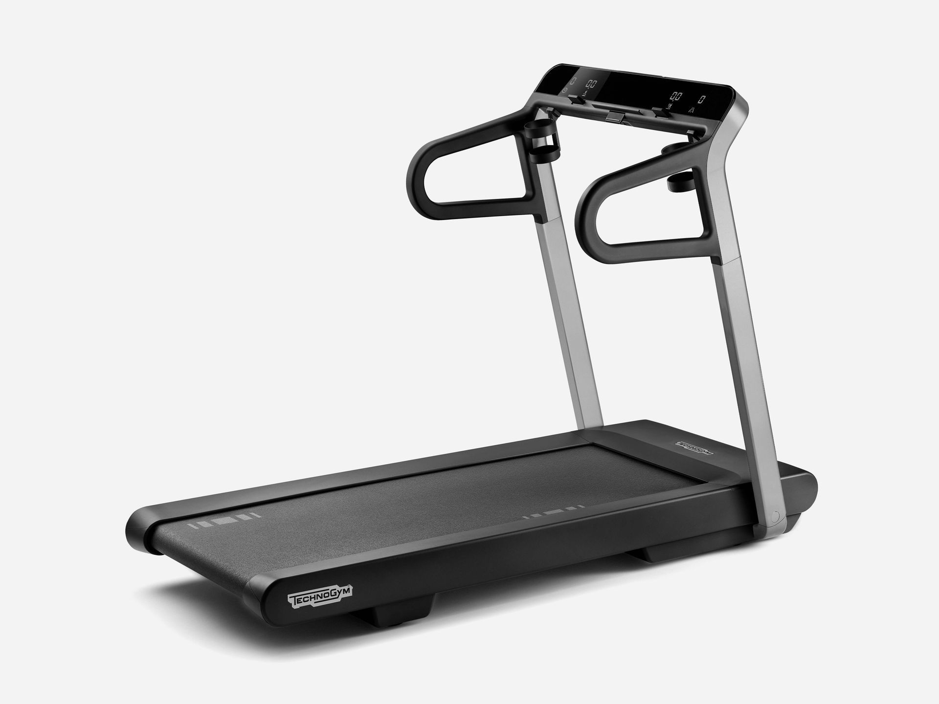 A black Technogym treadmill with silver upright supports shown at an angle against a light gray background.