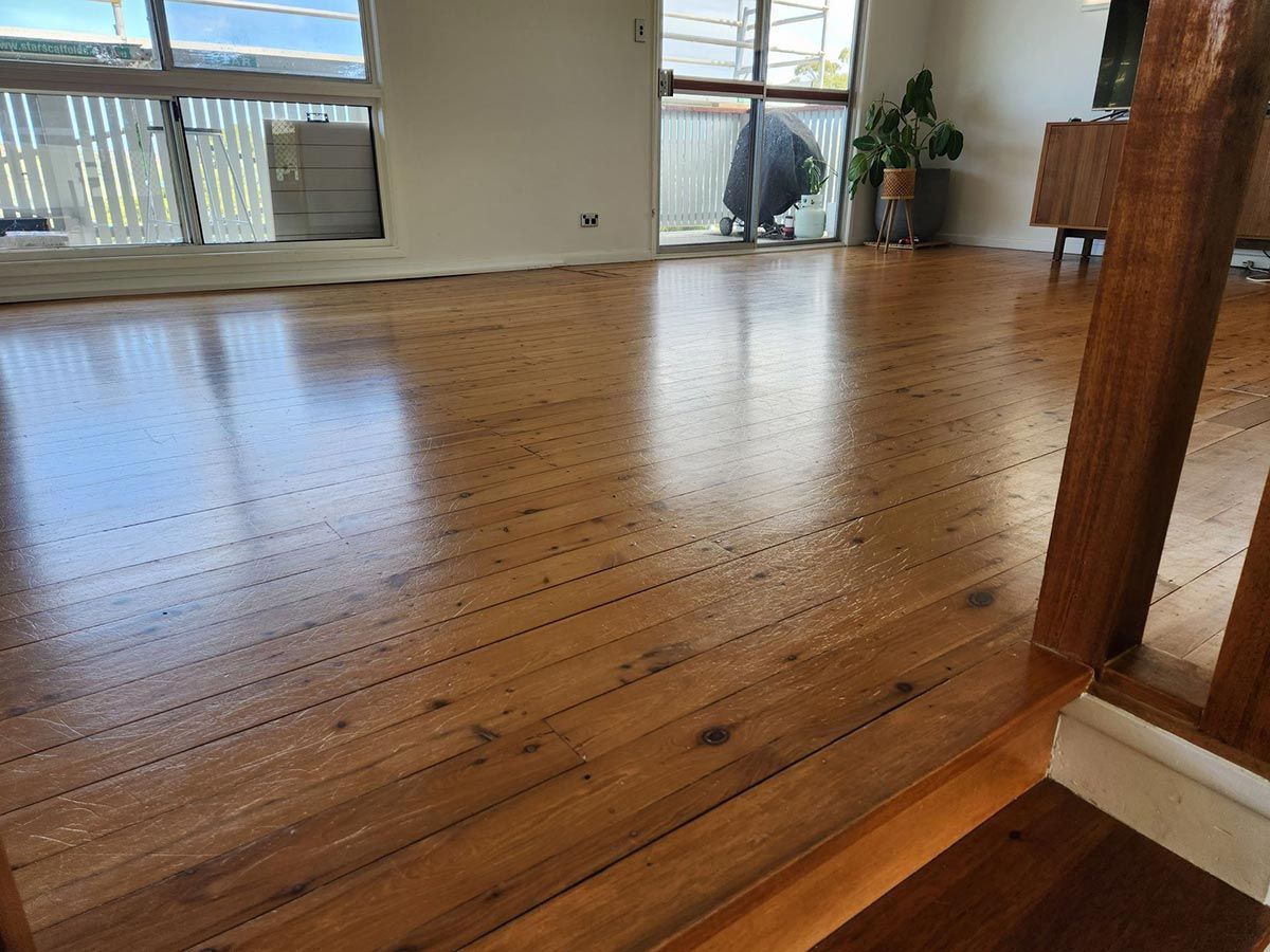 Refinished Wooden Floor in A Sunlit Room — KirraLina Cleaning Services in Tweed Heads, NSW