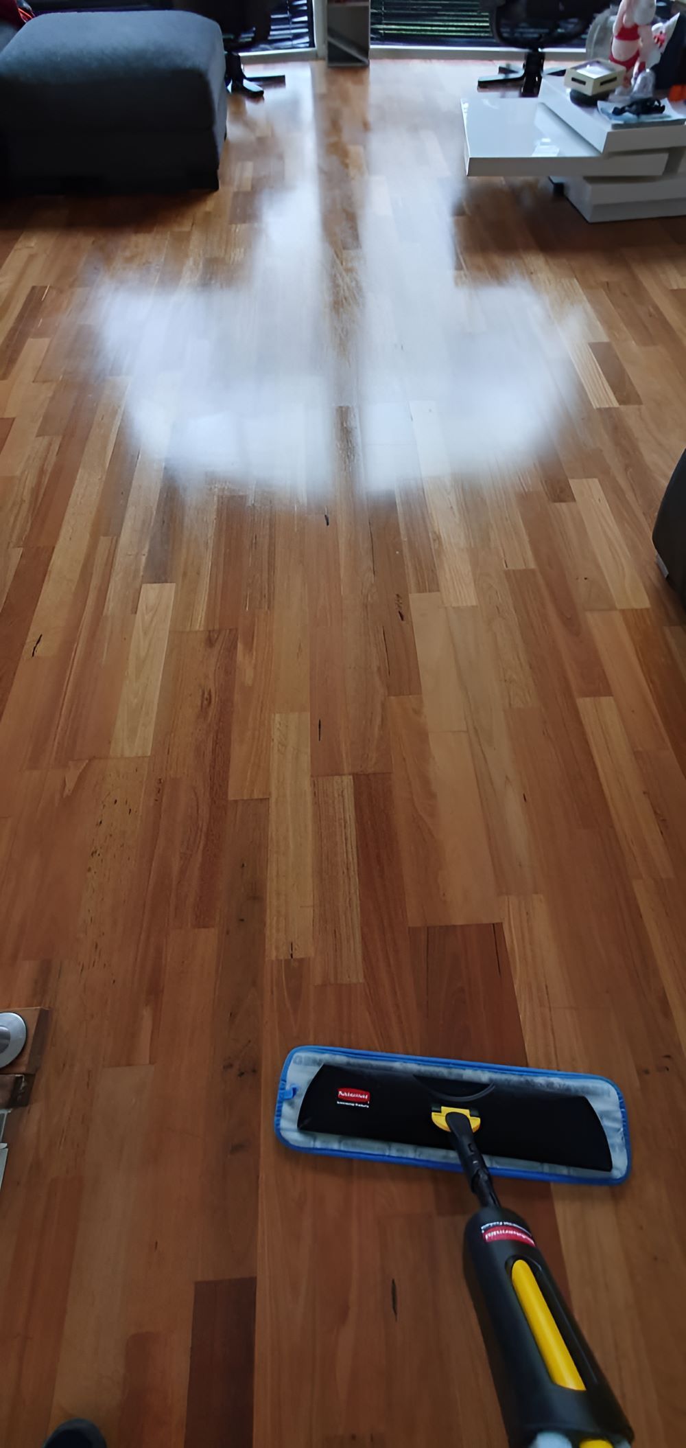 A Man Mopping the Floor — KirraLina Cleaning Services in Gold Coast, QLD