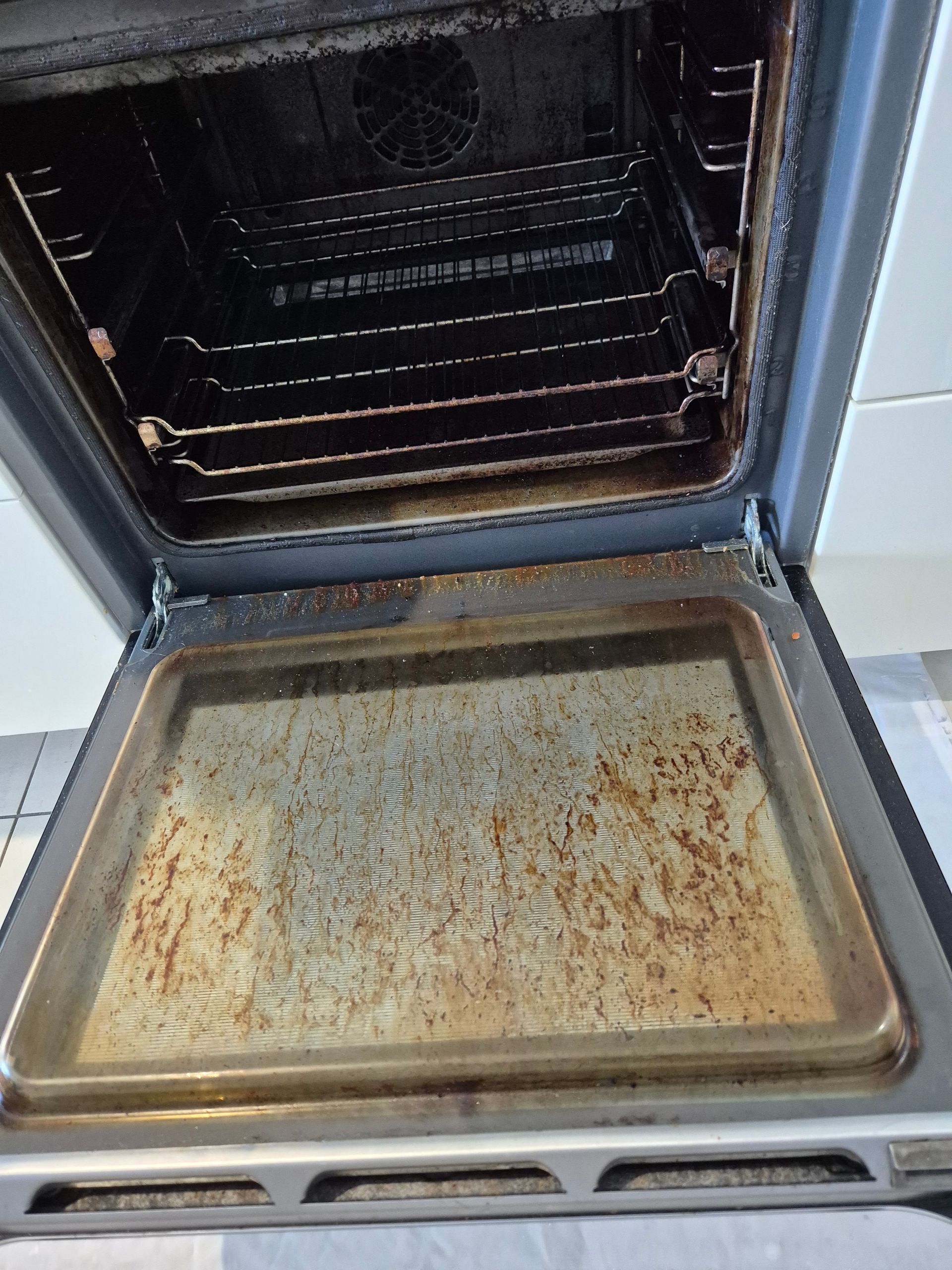 Before: Dirty Oven Interior With Food Residue and Grime — KirraLina Cleaning Services in Palm Beach, NSW