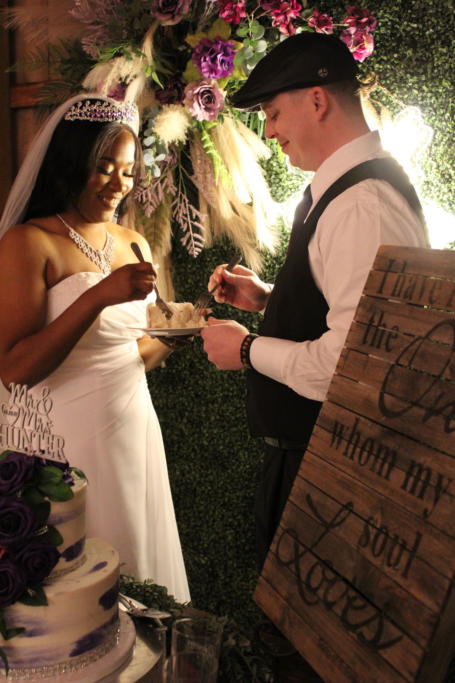 bride and groom eating cake