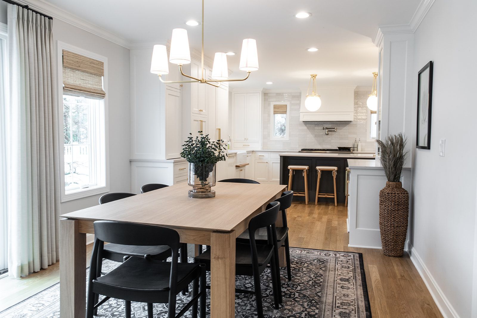 A dining room with a wooden table