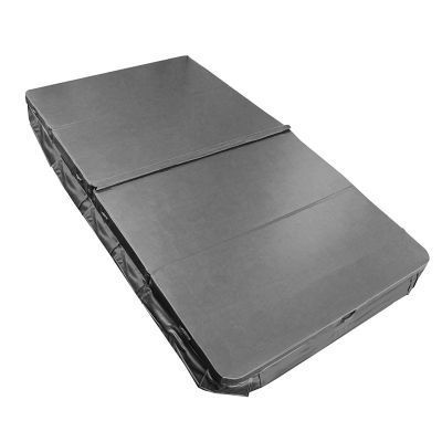 A gray mattress is sitting on a white surface.