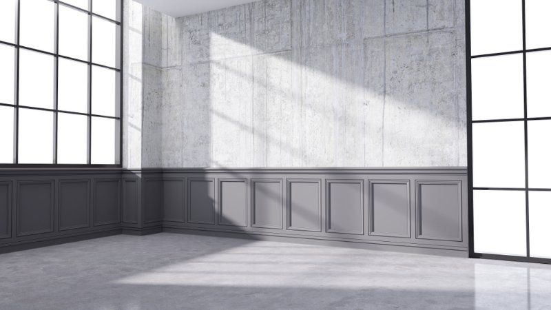 An Empty Room With a Lot of Windows and a Concrete Floor — Clean Line Plastering in Forster - Tuncurry, NSW