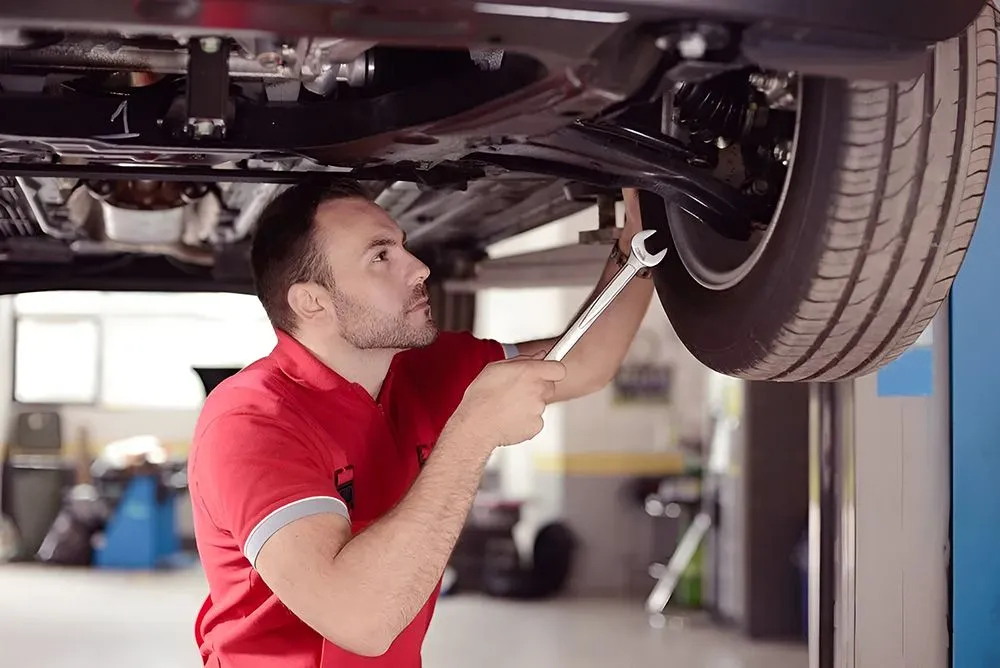 Mechanic Doing Maintenance on A Car