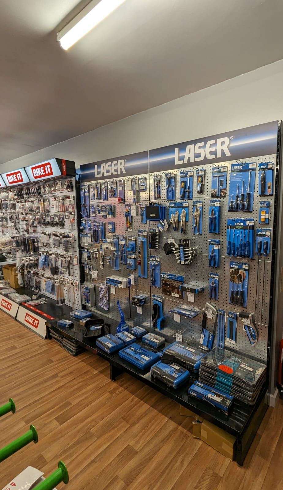 Tools on display at a store, mostly in blue packaging, with the
