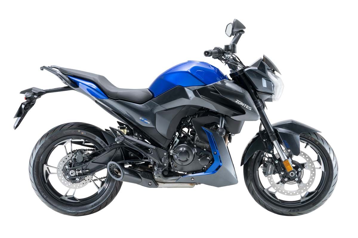Blue and black motorcycle on a white background.
