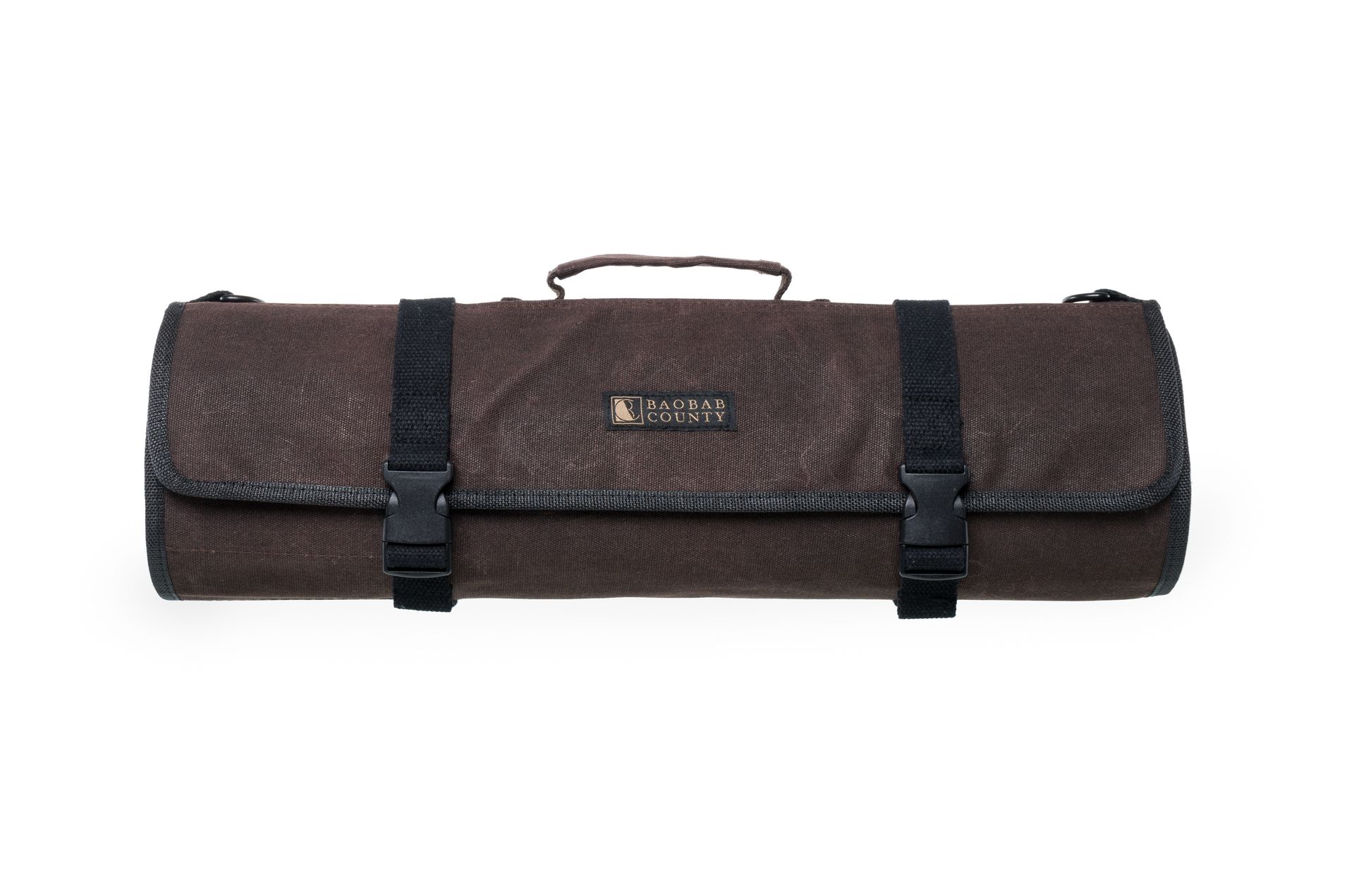 Brown rolled tool bag with handle and two straps.