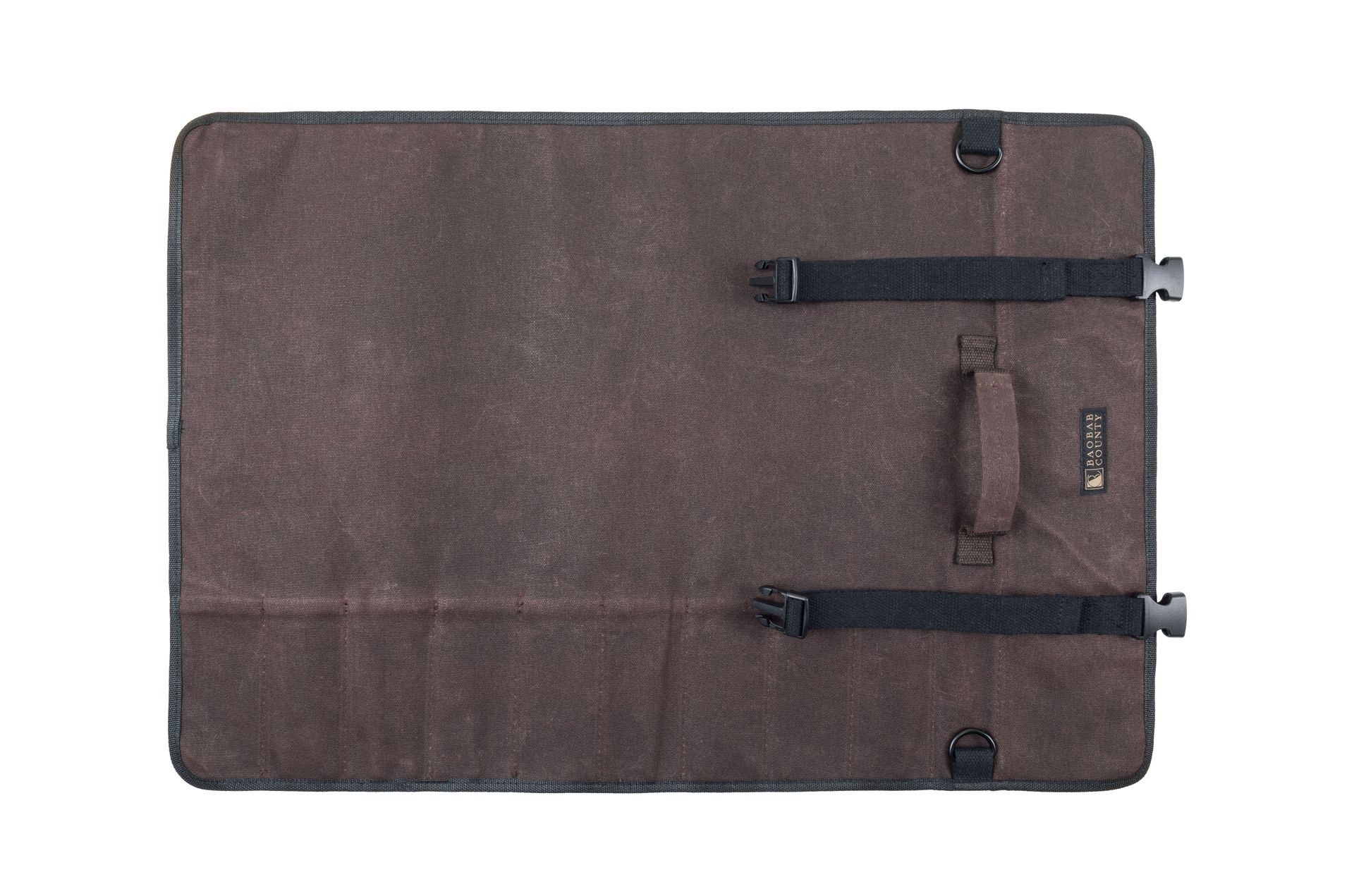 Brown, rolled-up tool roll with black straps and buckle closures. Features a carrying handle and the brand label