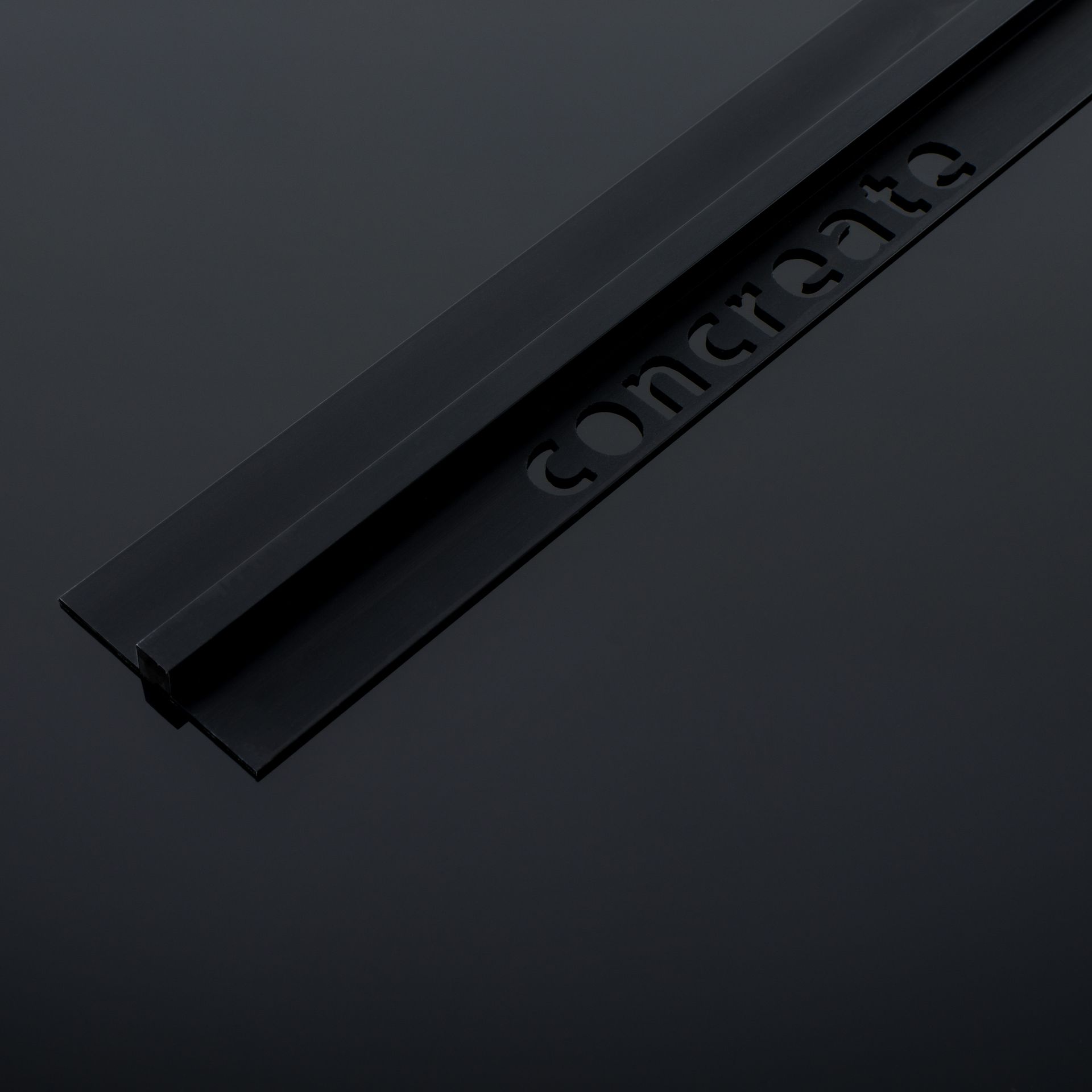 Black concrete joint strip with embossed