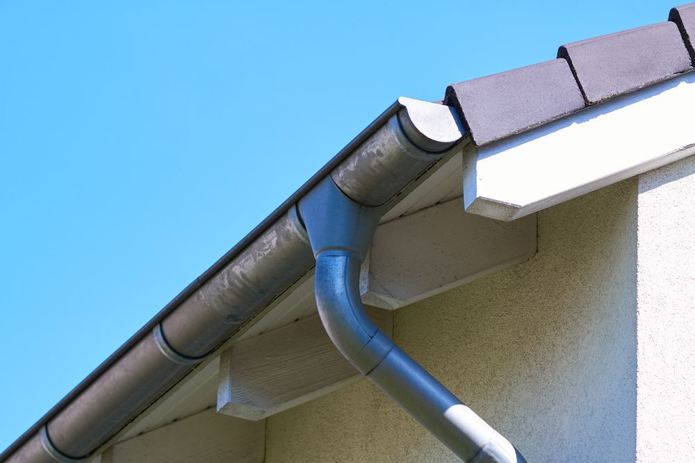 A Close Up of a Gutter on the Side of a Building — Gutterpro Townsville In Kelso, QLD