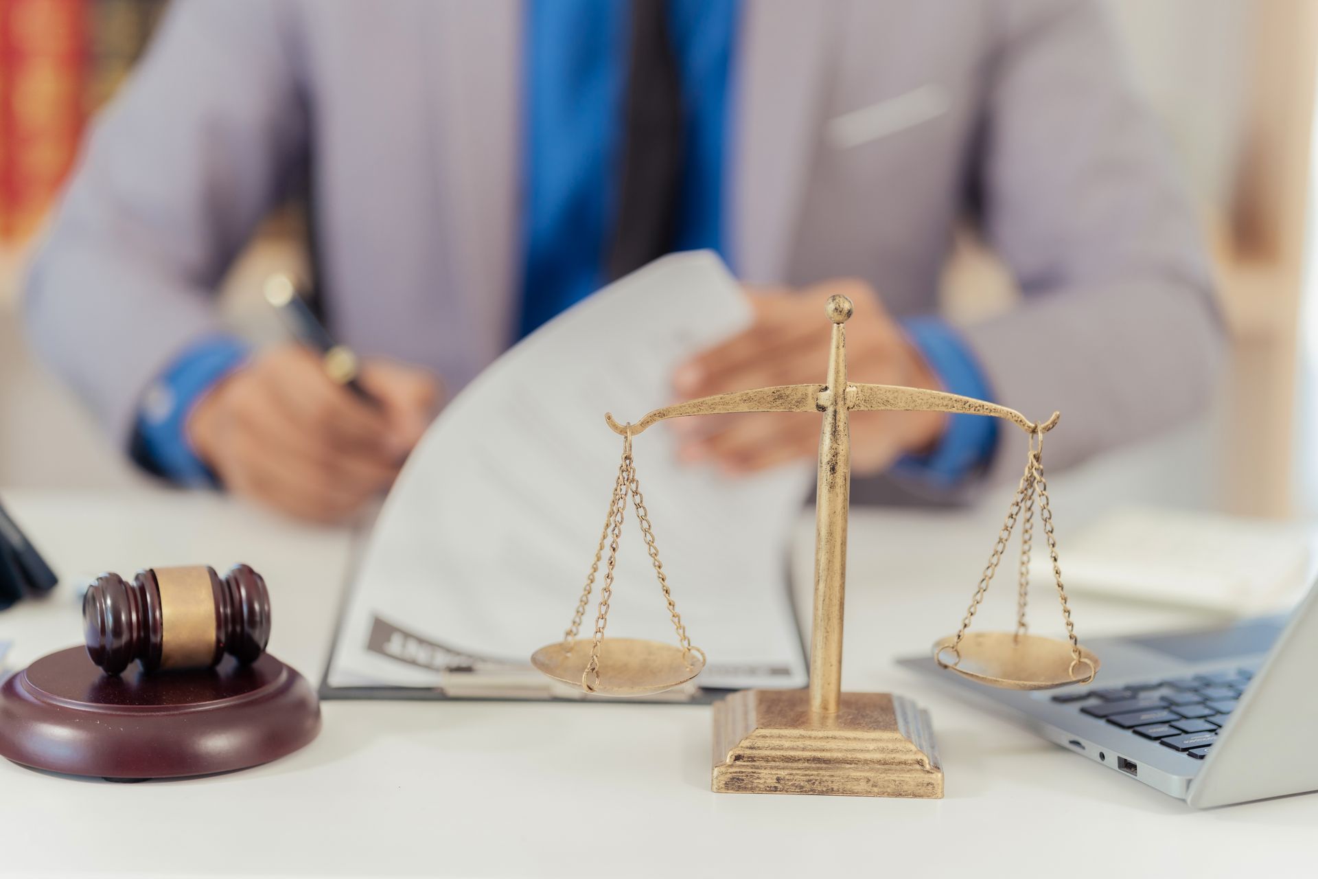 Lawyer with scales, gavel 
