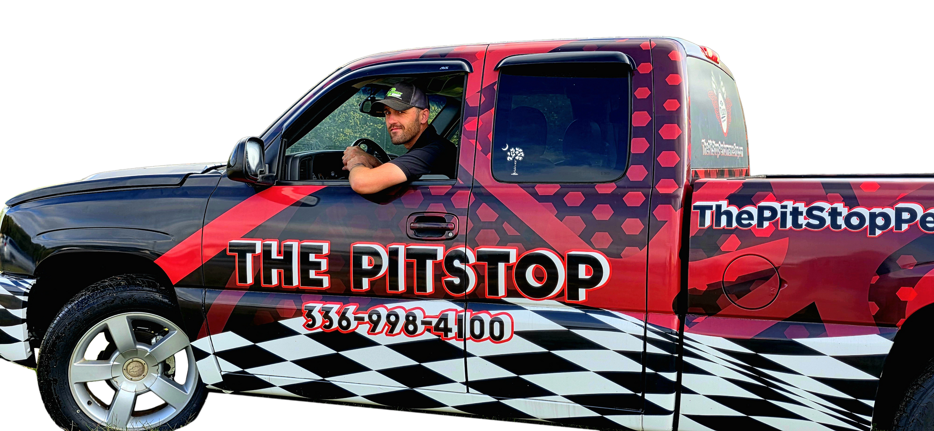 A man in a black truck with 