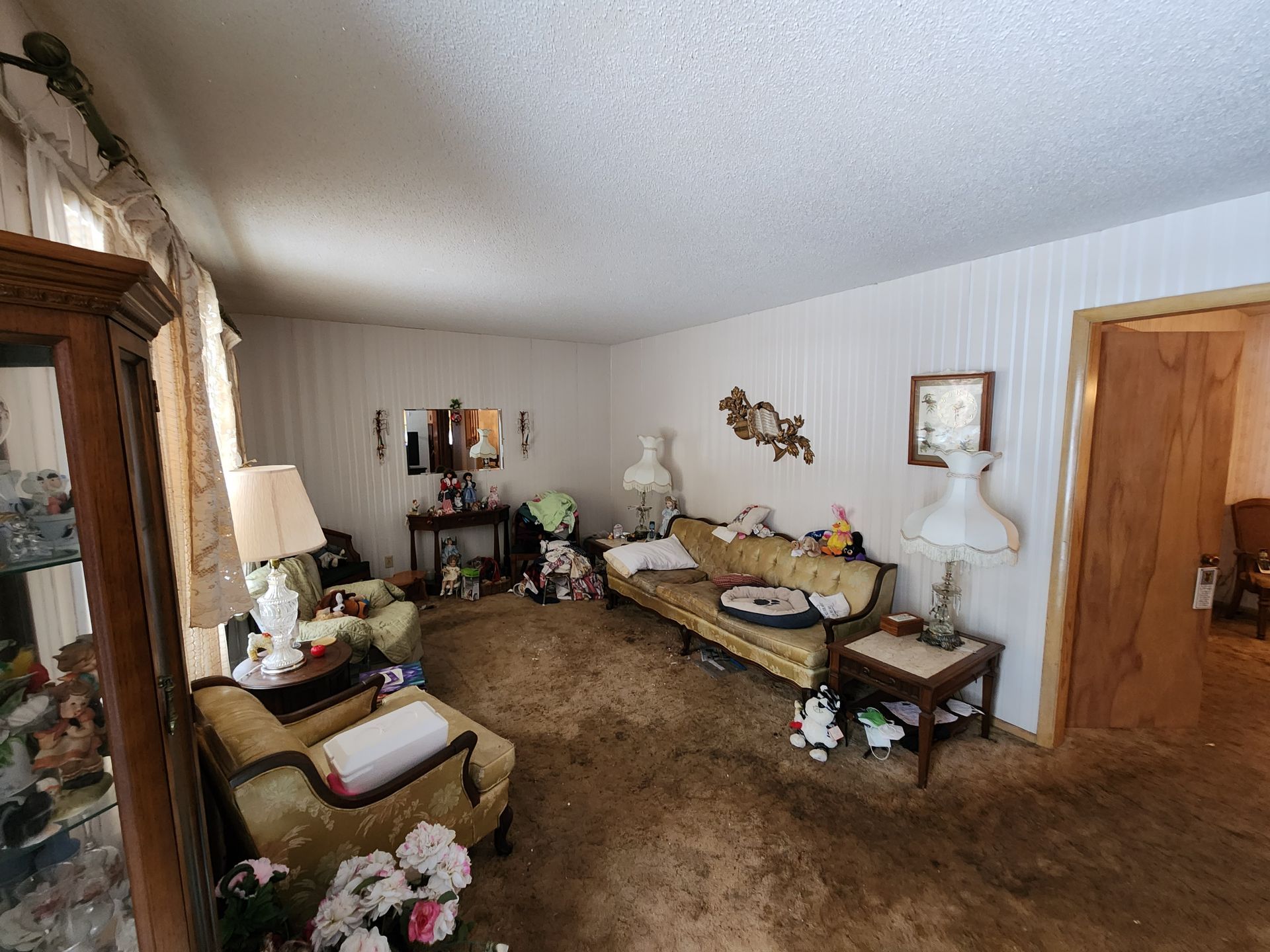 A living room filled with furniture and a couch.