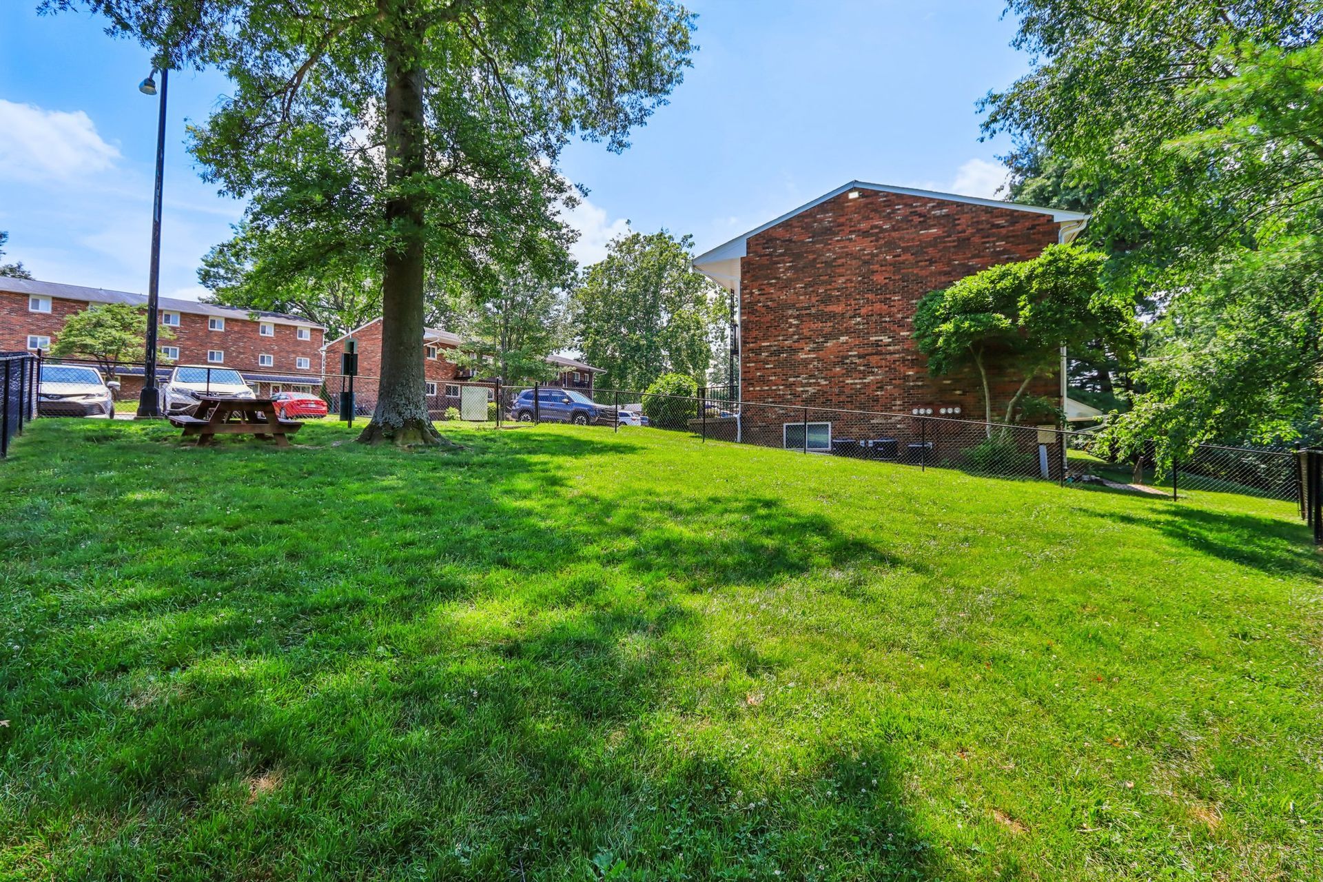 Relax outdoors at Meadow Park with green space, picnic areas, and peaceful Bloomington living.