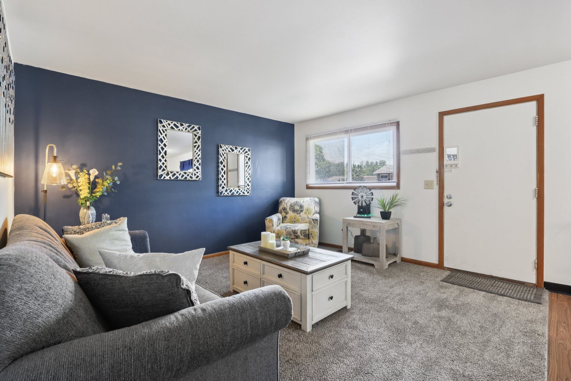 Spacious apartment living room with open layout at Meadow Park in Bloomington, Indiana