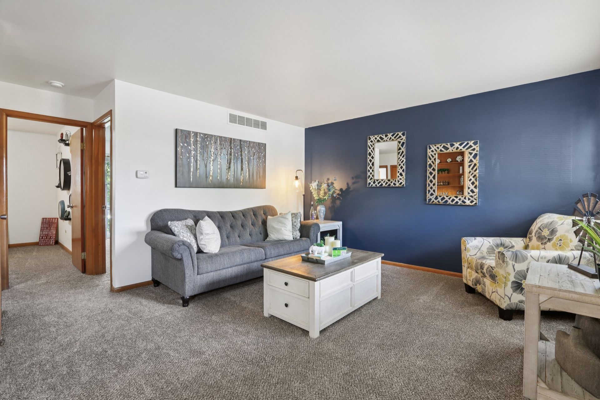 Spacious apartment living room with open layout at Meadow Park in Bloomington, Indiana