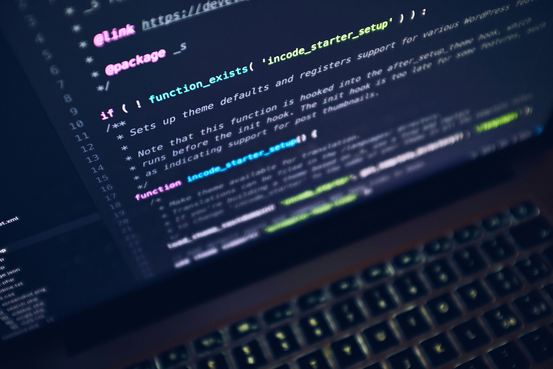 A laptop with a bunch of code on it
