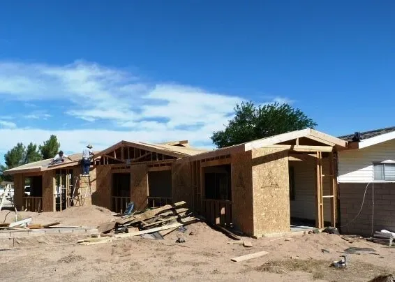 Workers working on wide house — Hesperia, CA — Bergstrom Construction