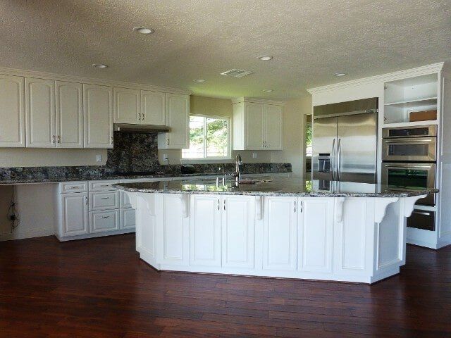 Clean kitchen with white drawers — Hesperia, CA — Bergstrom Construction