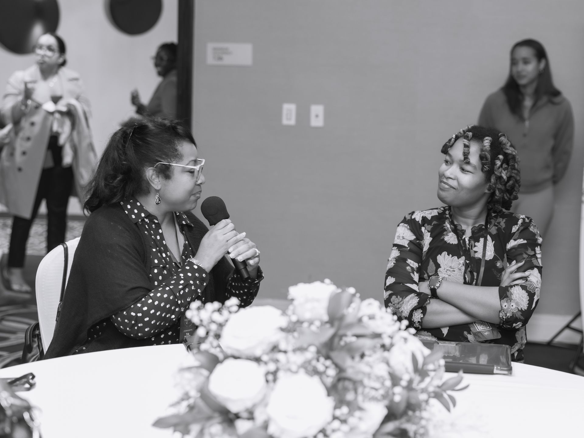 Listening to a speaker at an event