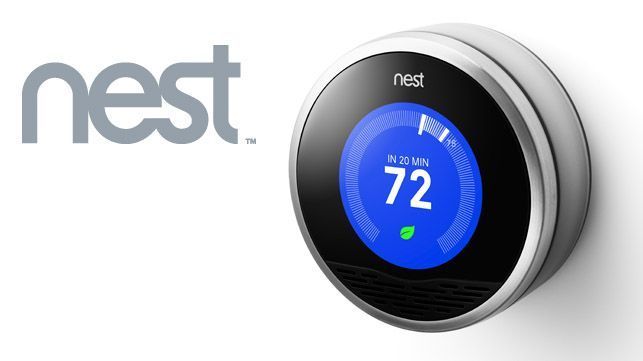 Nest smart thermostat with blue circular display showing 72° beside the Nest logo