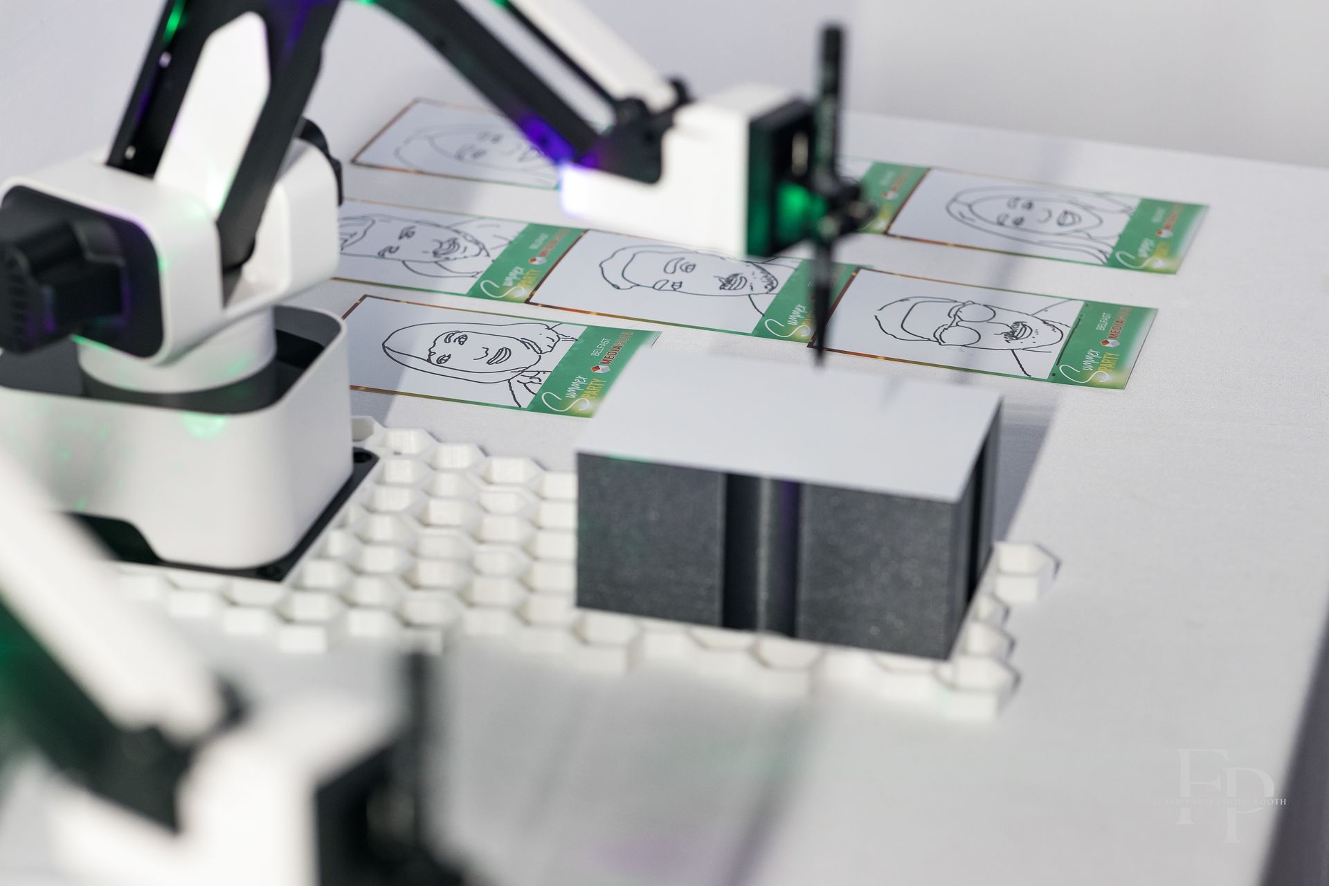 Live AI sketch drawing photo booth creating portraits at events