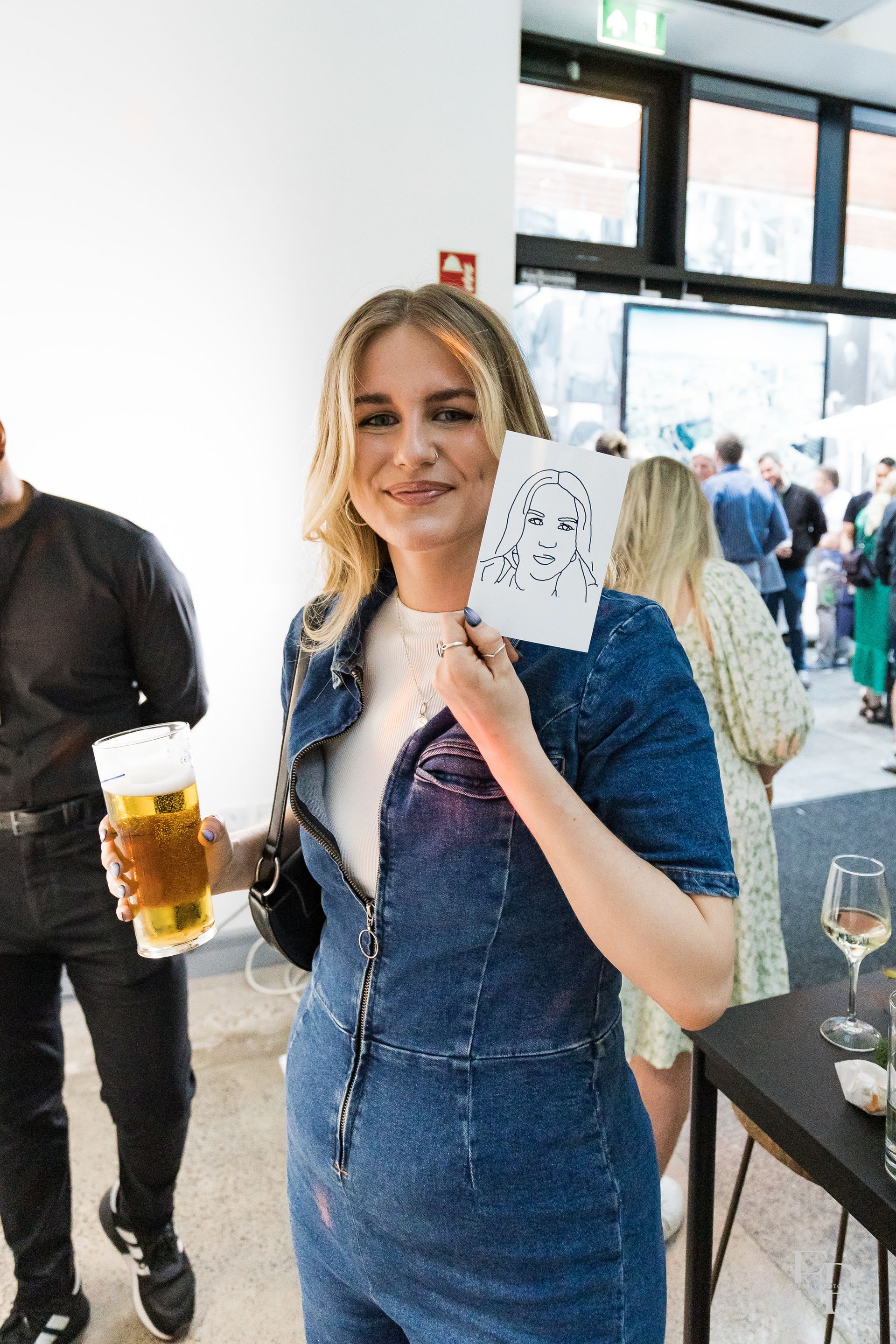 Interactive AI Sketchbot booth creating sketch portraits