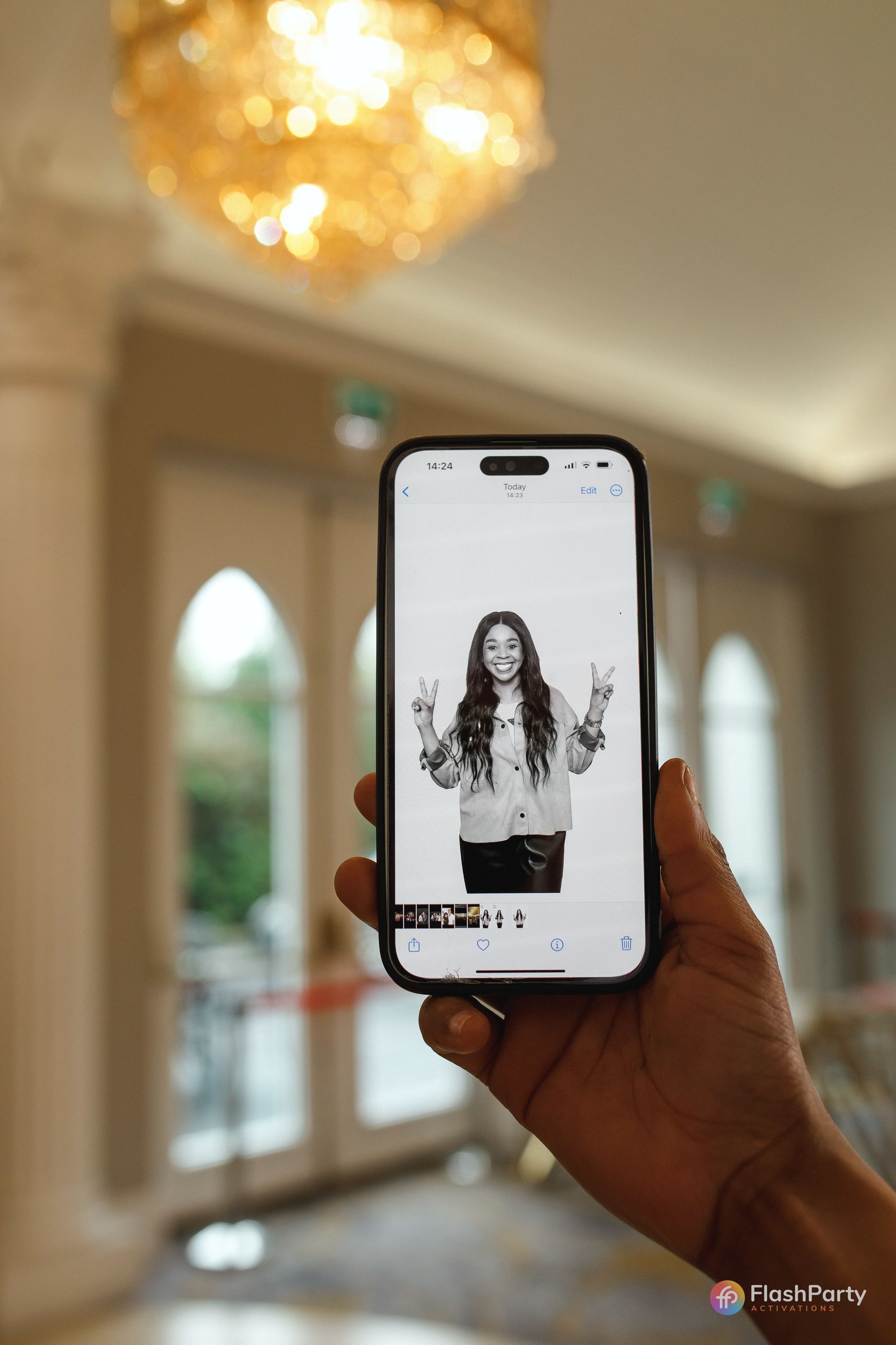 Dallas party guests capturing fun moments at glam photo booth