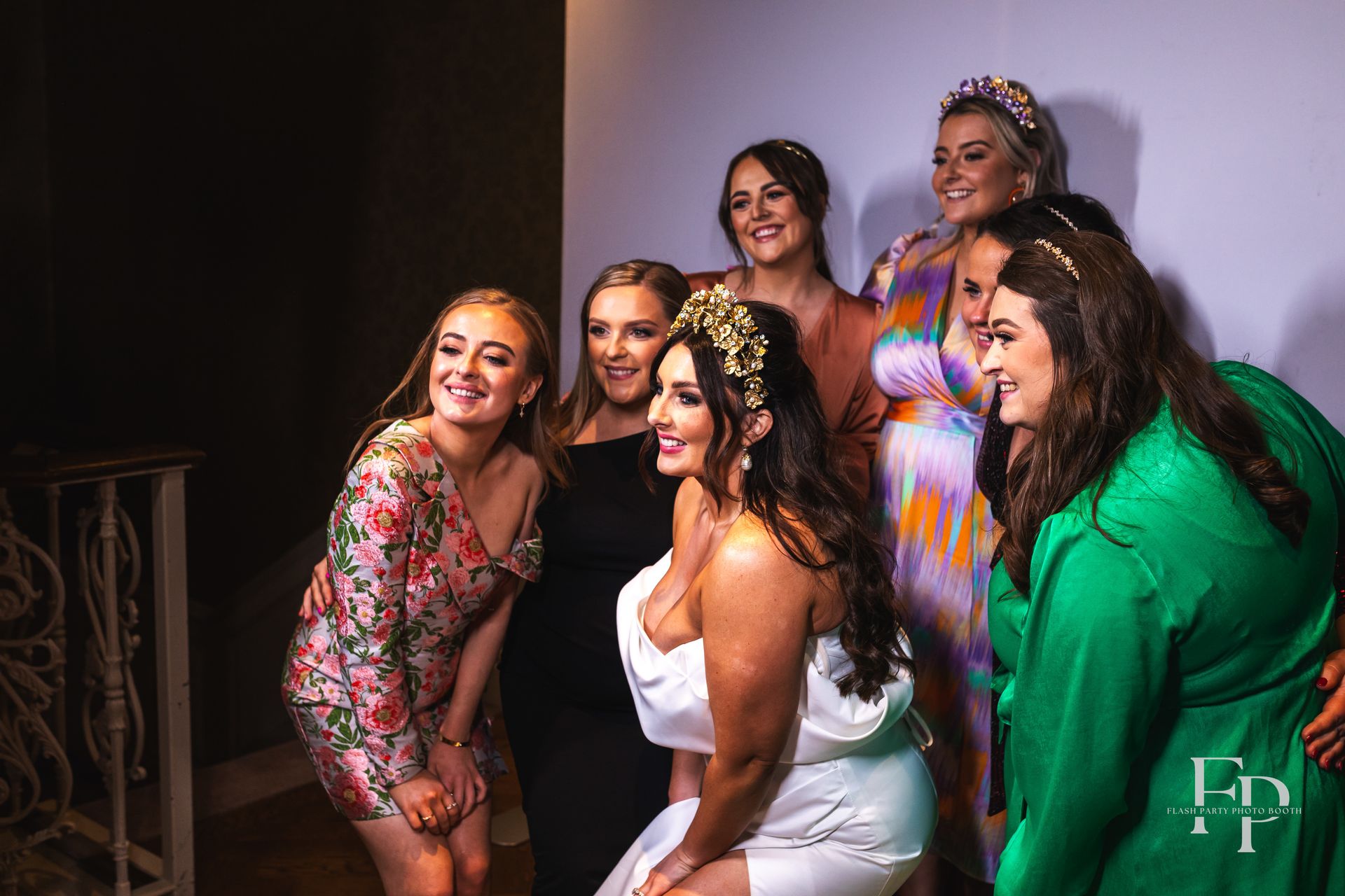 Texas guests posing for personalized photos at social booth