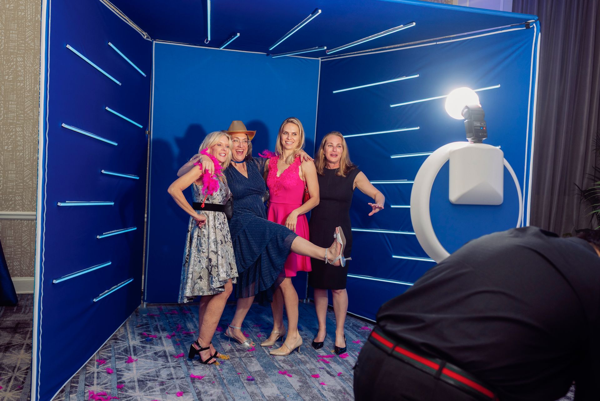 San Antonio guests posing in LED Vogue photo booth