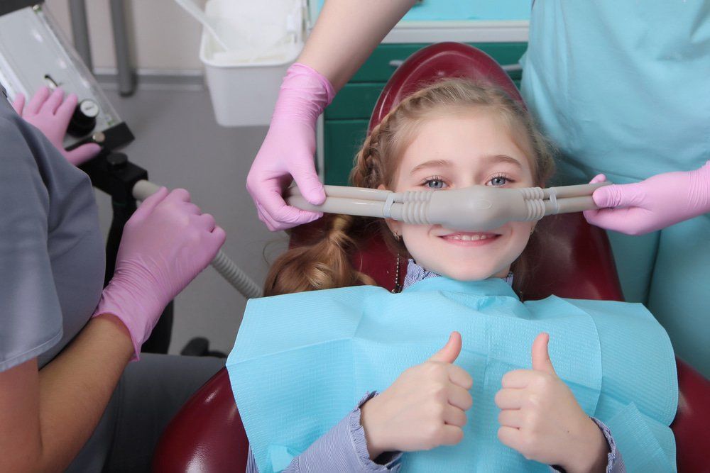 Young Female Having Nervous Patient Sedation — Dentists in Nelson Bay, NSW