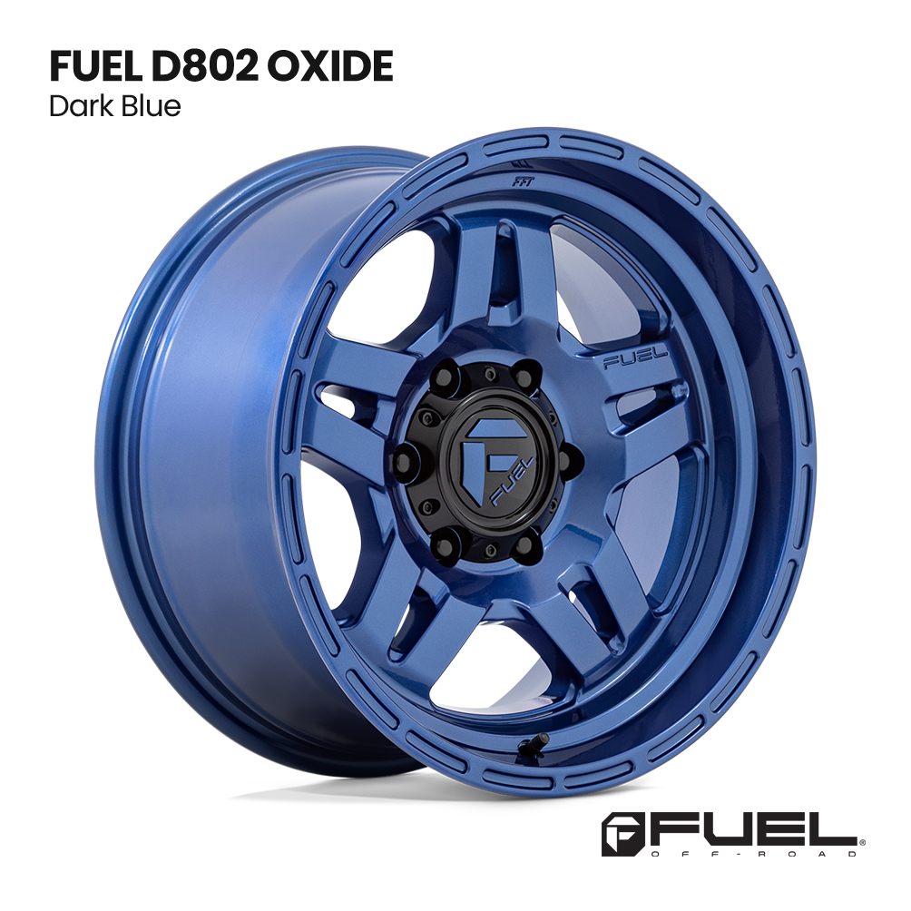 Dark blue Fuel D802 Oxide alloy wheel rim, angled product view on white background