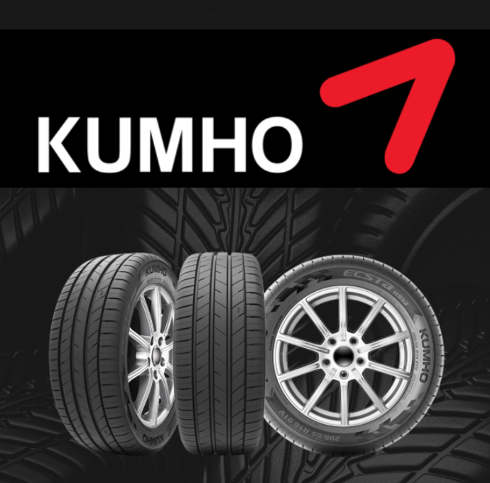 KUMHO tire ad with three black car tires and a red upward arrow on a dark background