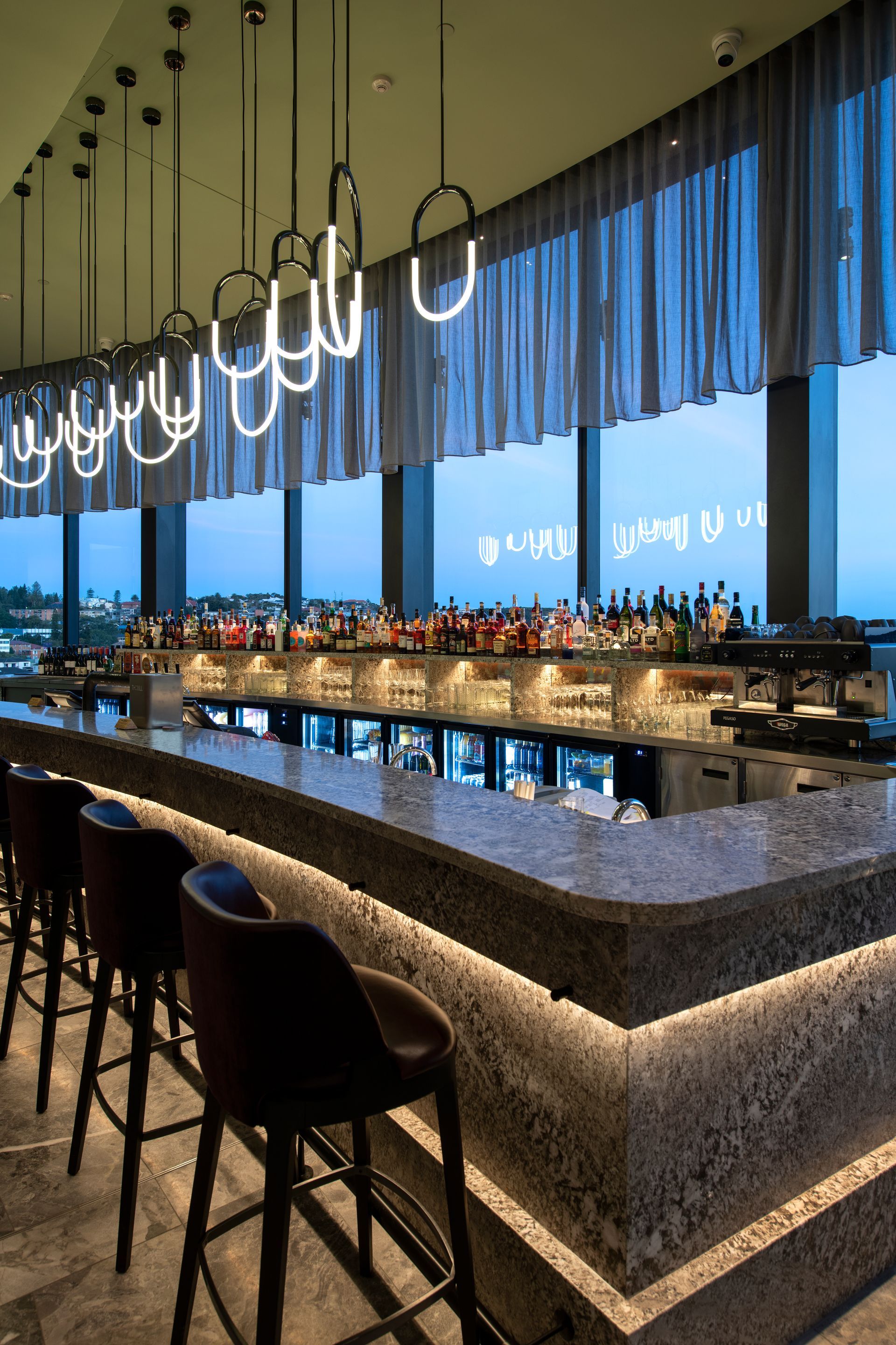 Photo of the Krystalbrook Kingley Roundhouse bar a completed commercial project by HVGM with stone benchtop