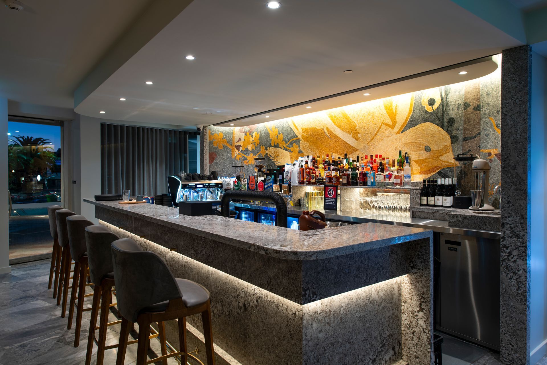 Photo of the Krystalbrook Kingsley bar a completed commercial project by HVGM with stone benchtop