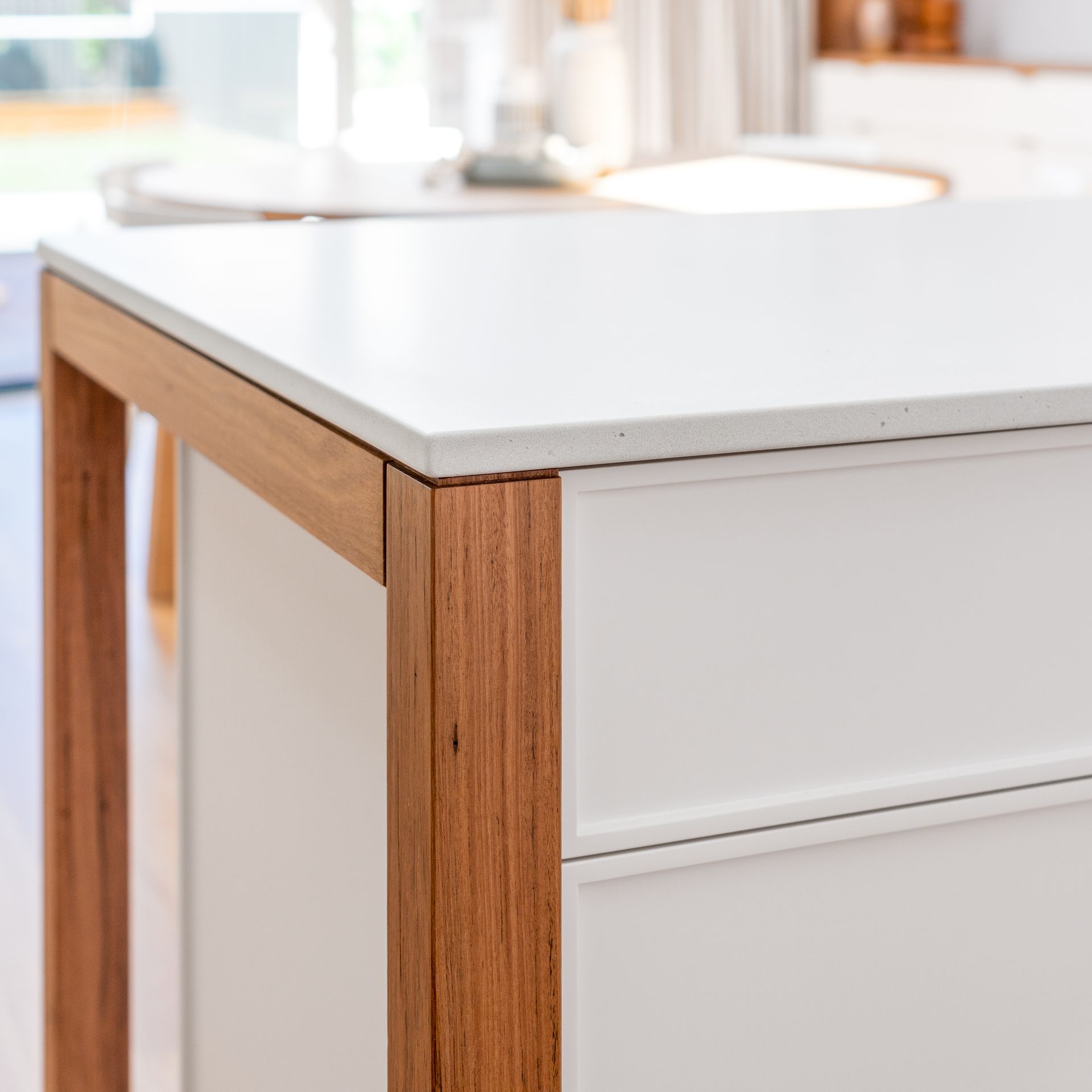Photo of kitchen island with stone benchtop
