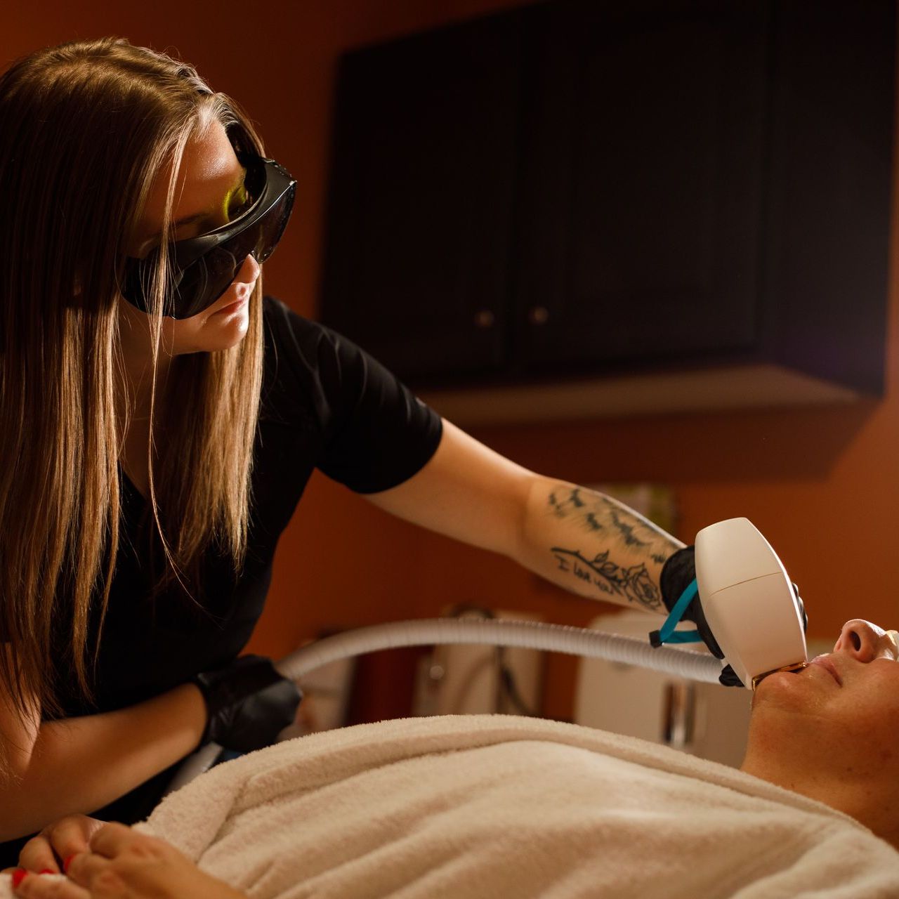 A woman receiving a Diolaze treatment