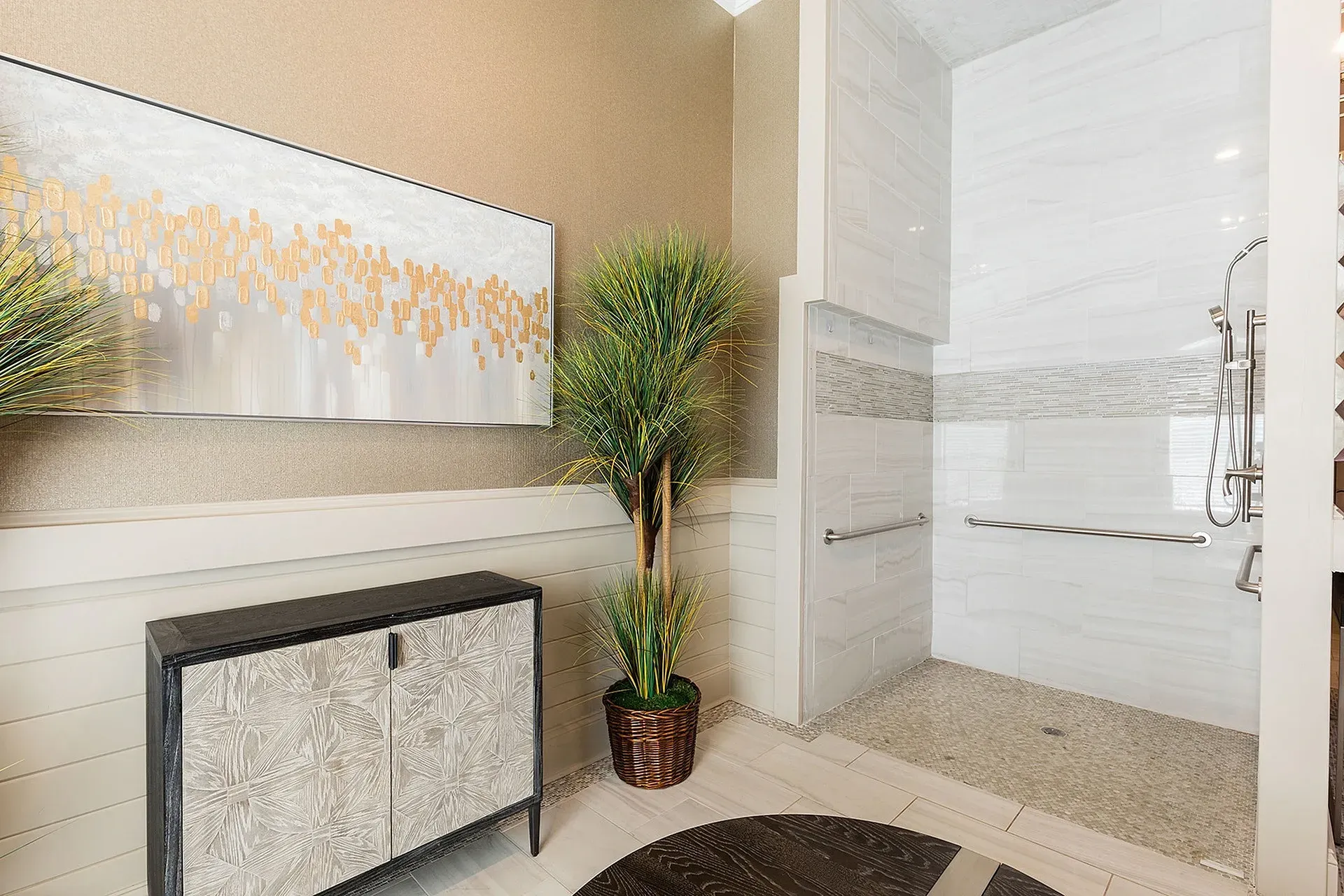Accessible apartment bathroom with walk-in shower and grab bars.