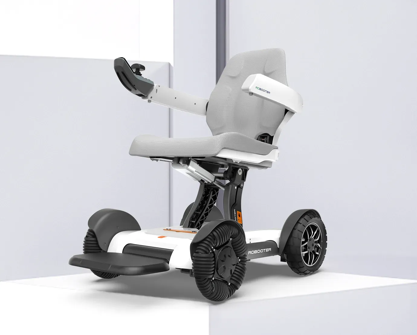 A white and black electric mobility chair with armrest, seat, and footrest.