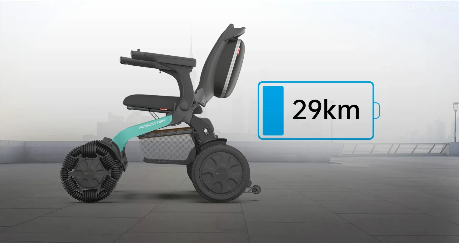 Electric wheelchair with a 29km battery life display on a paved surface.