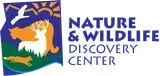 Nature & Wildlife Discovery Center logo with a white rabbit on a green hillside under a blue sky