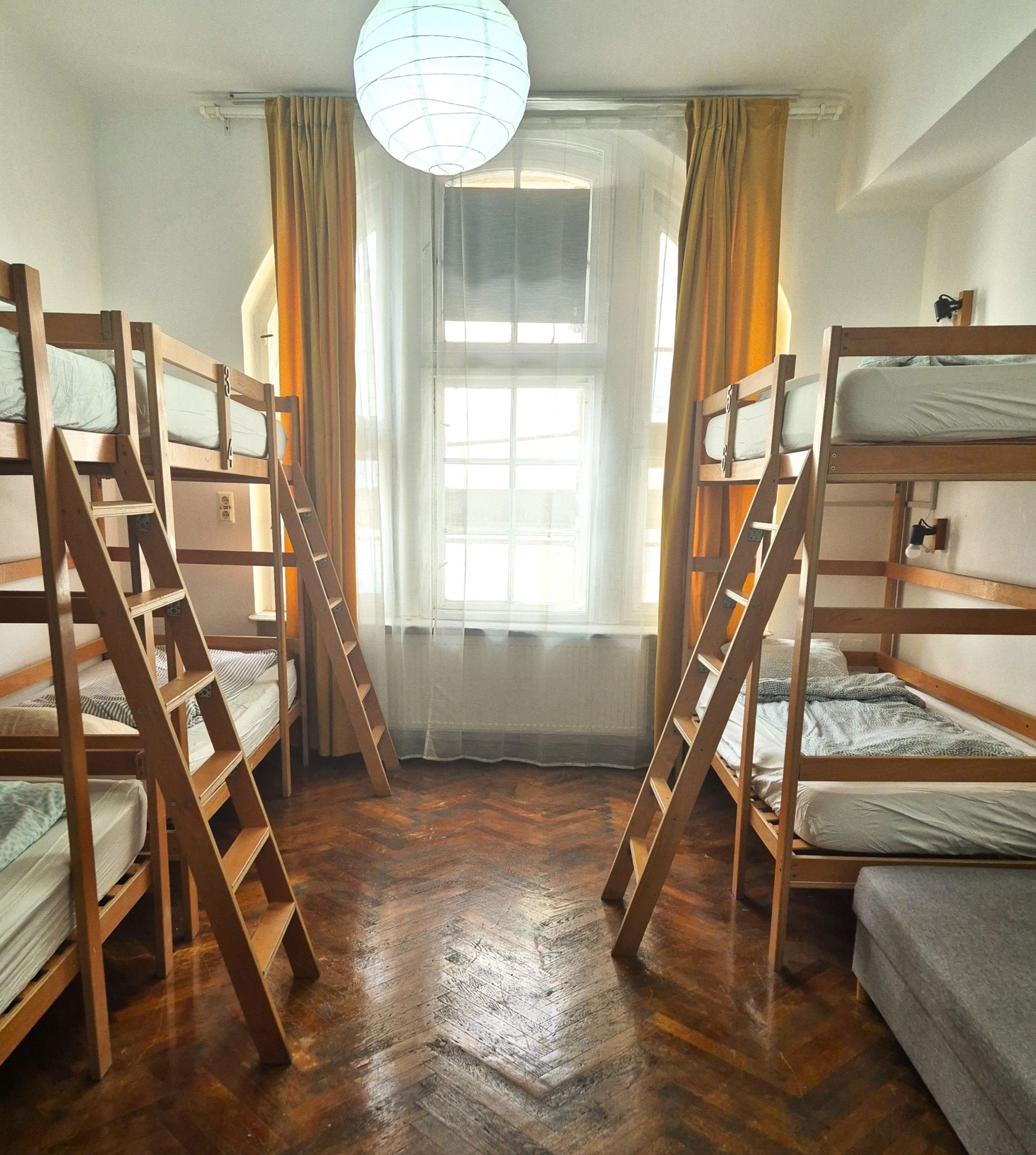 Shared dorm room in Brasov backpacker hostel
