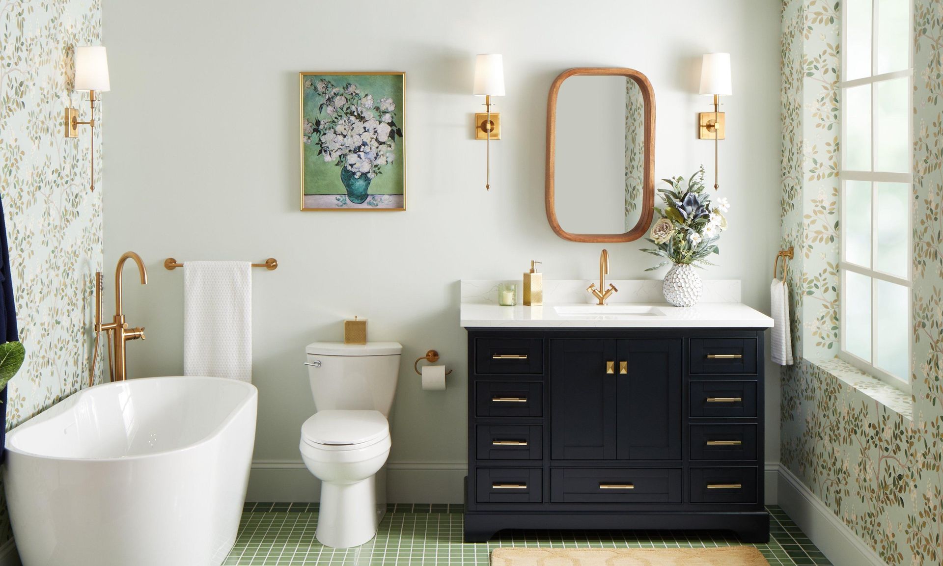 A bathroom with a bathtub , toilet , sink and mirror.