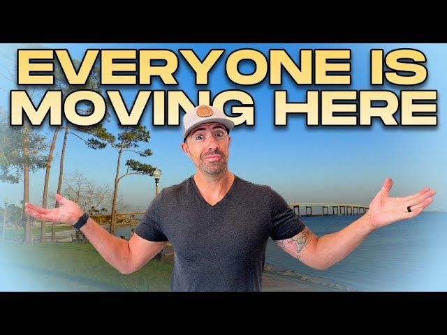 Man standing outdoors with arms outstretched beside bold text reading “EVERYONE IS MOVING HERE”