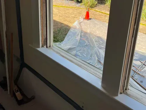 Window removed in older home for new window replacement